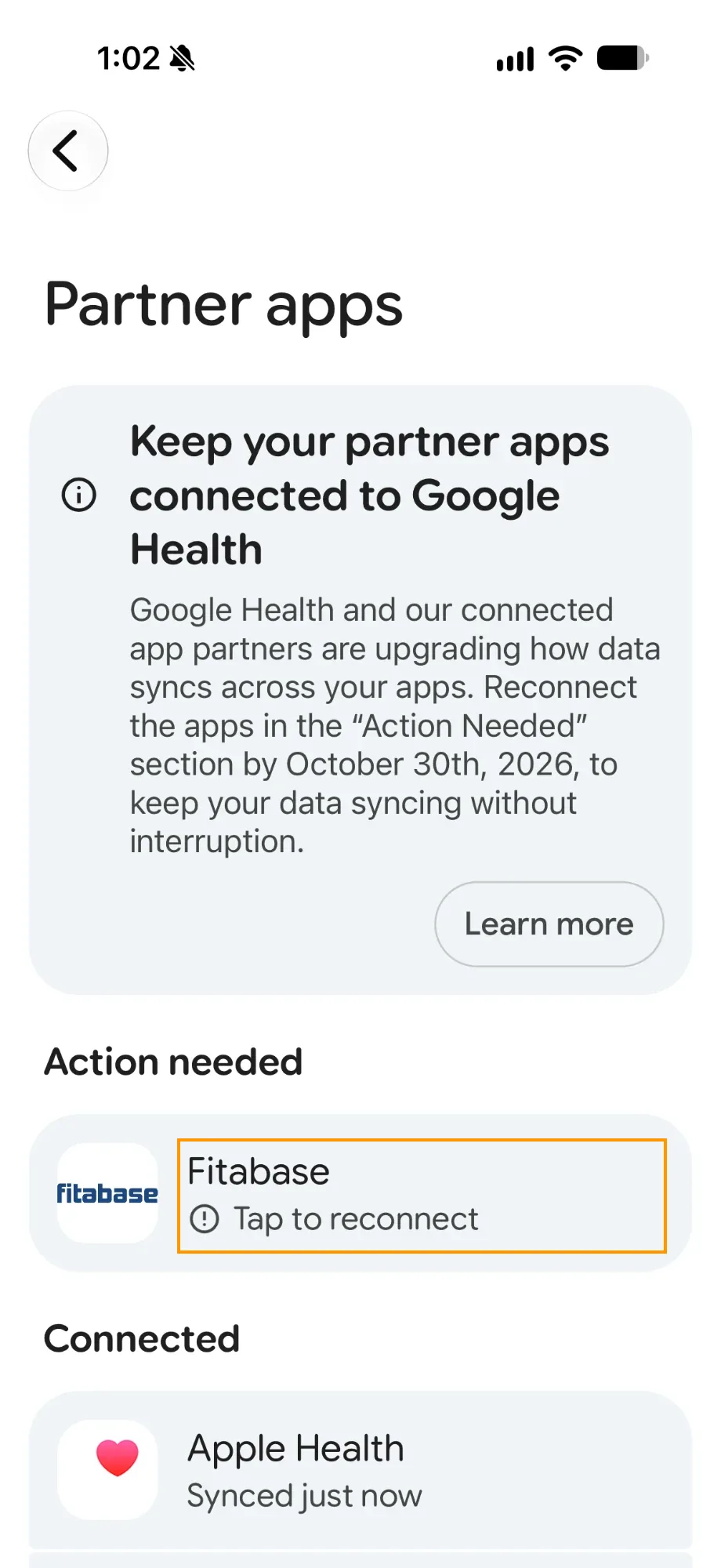 The Google Health app Partner apps screen with Fitabase listed under Action needed and Tap to reconnect highlighted